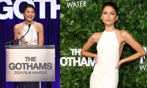 Zendaya smiling broadly while standing behind a silver podium that reads "THE GOTHAMS 2024 FILM AWARDS."