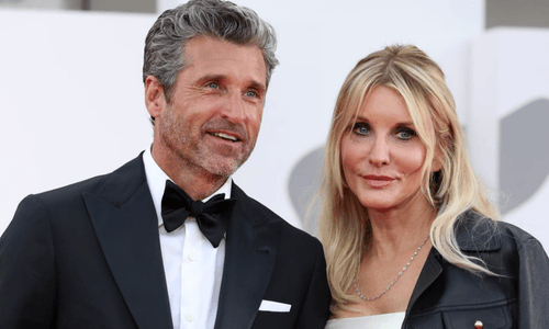 Patrick Dempsey and Jillian Fink smiling together at a public event