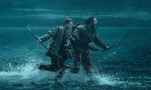 Scene from 28 Years Later showing two people running through water to escape fast-moving infected.