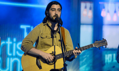 Noah Kahan performing during Stick Season era