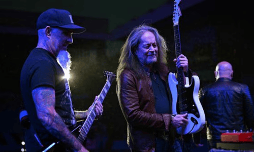 Ozzy Osbourne on stage during Black Sabbath's final concert, spotlight capturing an emotional farewell