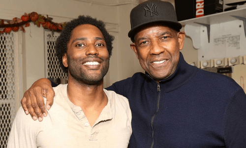 Denzel Washington and his son, John David Washington, are smiling together.