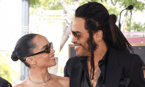 Lenny Kravitz smiles at his daughter, Zoë Kravitz, while attending an event on the Hollywood Walk of Fame.