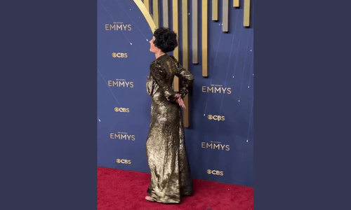 Halsey in snakeskin-textured dress at Emmys 2025