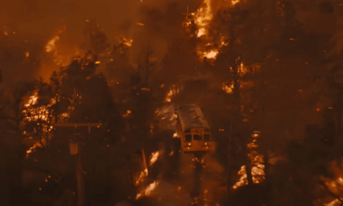Matthew McConaughey as bus driver Kevin McKay steering children to safety in The Lost Bus.