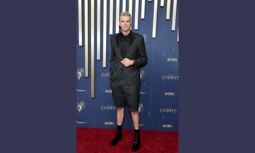 Timothy Simons wearing shorts suit on Emmys 2025 red carpet.