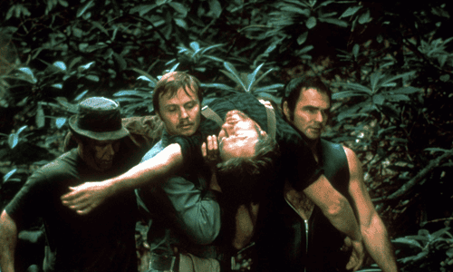 Wolf Creek horror movie scene with backpackers trapped in the outback.