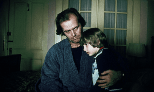 Exterior of the Overlook Hotel from The Shining (1980), a setting of isolation and malevolent forces.