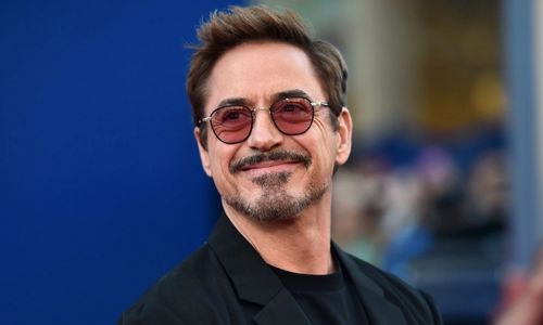 Robert Downey Jr. photographed at a public appearance, symbolizing his return to serious acting roles after blockbuster fatigue.