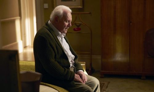 Anthony Hopkins pictured later in life, expressing a calm and reflective demeanor during a public appearance.