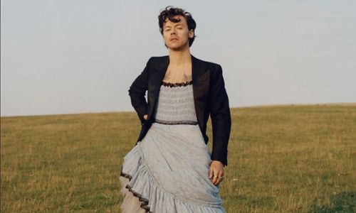 harry styles gender-fluid high fashion look featuring bold tailoring and expressive styling.
