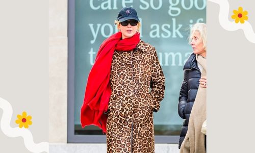 Jennifer Lawrence wearing a scarf styled over pants during a street fashion moment
