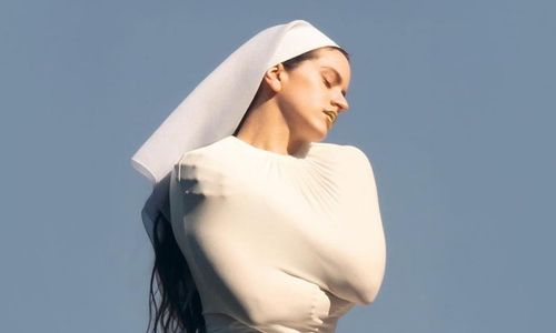 Rosalia Avant-garde couture look blending cultural inspiration with bold fashion design.