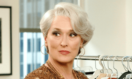 Meryl Streep standing confidently, highlighting her commanding screen presence beyond age or height.