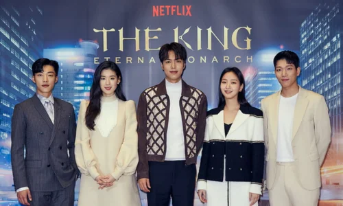 The members of BTS posing together on the filming set of 'The King: Eternal Monarch.'