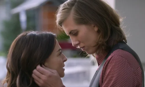 Caterina Scorsone and E.R. Fightmaster posing together at Elton John’s Oscars after-party.