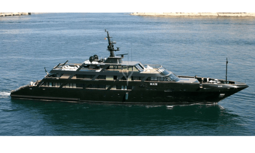 Giorgio Armani's minimalist 'Main' superyacht, featuring a unique dark military green hull and sharp architectural lines.