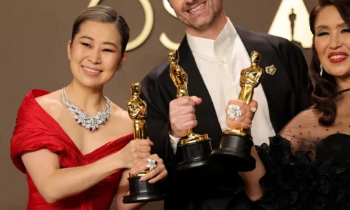 Director Maggie Kang at the Oscars after K-Pop Demon Hunters won Best Animated Feature.