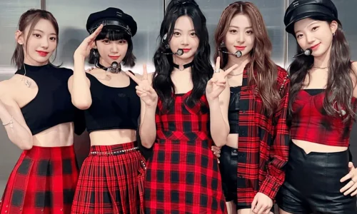 The members of LE SSERAFIM posing for a 'Fearless' concept photo, highlighting their modern K-Pop style.