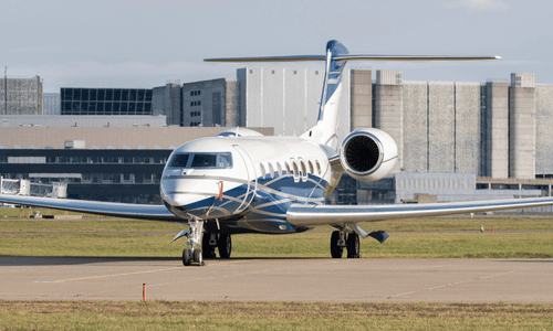 A high-performance Gulfstream G650 private jet, valued at $75 million, parked on an airport apron.