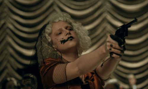 Dramatic scene from The Bride! highlighting its chaotic gothic style and outlaw romance story.