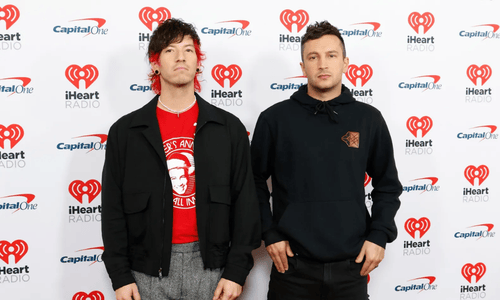 Twenty One Pilots performing at the 2026 iHeartRadio Music Awards after winning Alternative Artist of the Year.