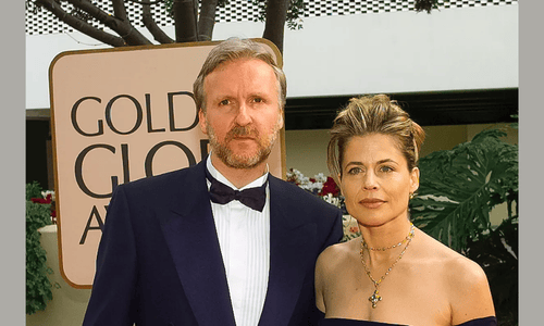 James Cameron and Linda Hamilton smiling together at a promotional event for the Terminator franchise.