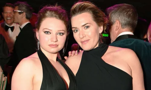 Kate Winslet and her daughter Mia Threapleton posing together in black outfits at the 2023 BAFTA Television Awards.