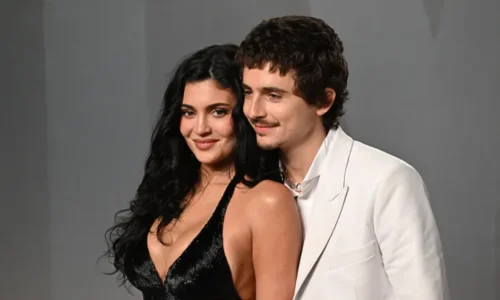 This image shows Kylie Jenner and Timothée Chalamet posing together at the Vanity Fair Oscar Party in Los Angeles. 