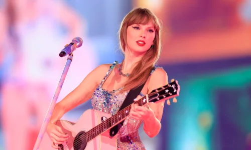 A wide-angle shot of Taylor Swift performing.