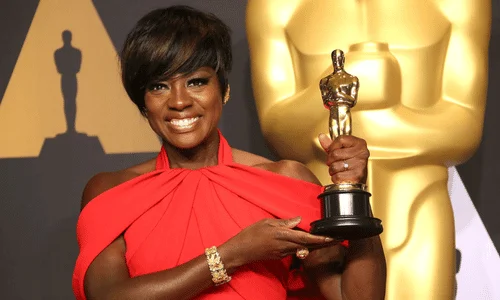 This image shows Viola Davis winning the Best Supporting Actress award for her role in "Fences" at the 89th Annual Academy Awards on February 26, 2017. 