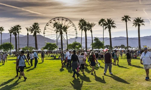 A vibrant crowd at Coachella 2026 "Western-Core" and crochet during a headliner's performance.