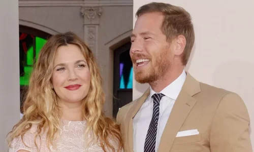 Drew Barrymore posing with former husband Will Kopelman