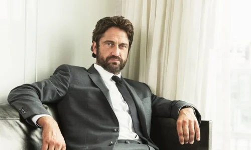 A close-up of Gerard Butler with his signature rugged look.