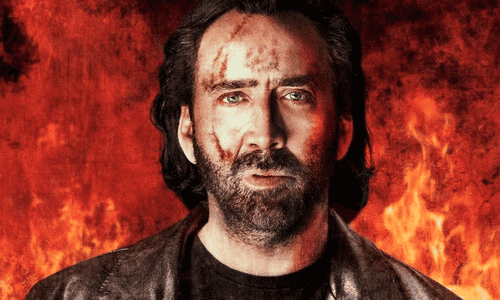 A photo of Nicolas Cage during his peak action hero era in the late 90s.