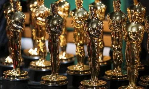 This image features multiple Oscars Award statuettes 