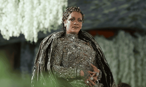 Rihanna in a metallic Maison Margiela dress with a spiral fabric structure at the 2026 Met Gala.