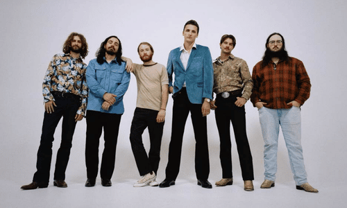 Country rock band The Red Clay Strays posing together after their Group of the Year victory.