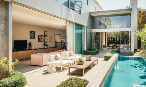 Exterior patio and pool area of Emilia Clarke’s Venice Beach home