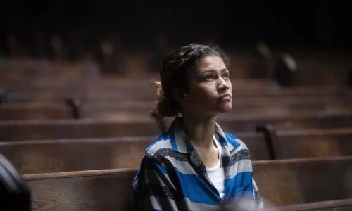 Zendaya portraying an emotional and weary Rue Bennett in a dramatic close-up from Euphoria season 3.