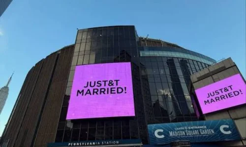 Madison Square Garden displaying Just Married messages on large digital screens in New York City