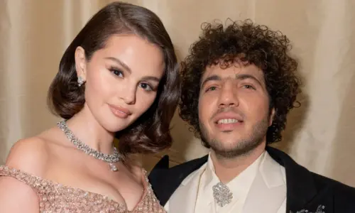 Selena Gomez and Benny Blanco posing together at a formal event
