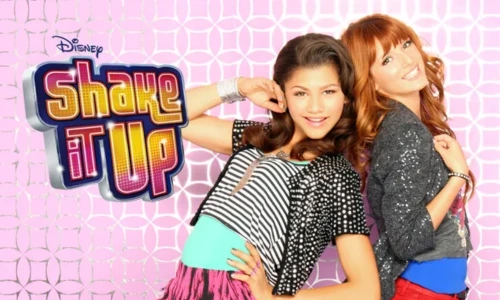 Zendaya and Bella Thorne smiling against a pink patterned background next to the Disney Shake It Up logo.