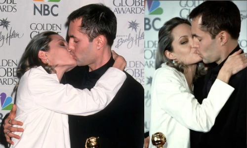 Angelina Jolie in a white jacket kisses brother James Haven on the lips while embracing his shoulder at the Golden Globes.