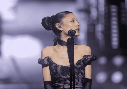 Ariana Grande performing on stage during the Eternal Sunshine Tour