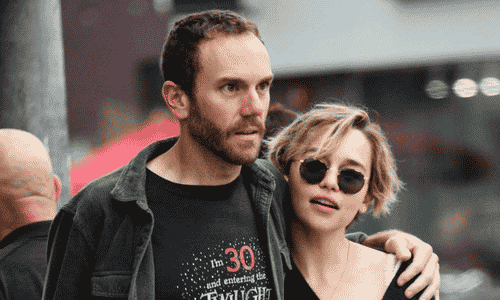 Emilia Clarke and Charlie McDowell posing together in a public photo