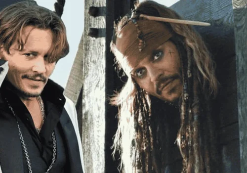Johnny Depp wearing a pirate costume in a Pirates of the Caribbean movie still
