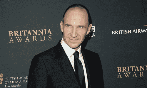 Ralph Fiennes posing for a portrait