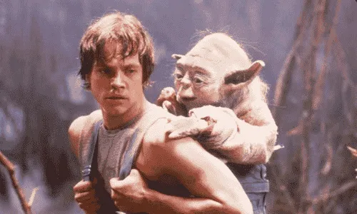 Luke Skywalker and Yoda in a Star Wars movie scene