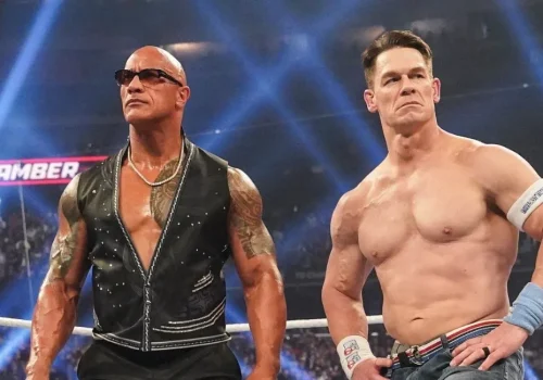 John Cena and Dwayne Johnson posing together during their WWE rivalry